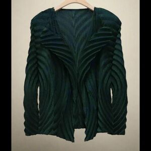 Pleated geometric cardigan Issey  Miyake style